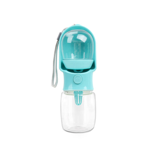 Blue VitalGroom portable pet hydration and treat bottle with clear reservoir, integrated trough, and wrist strap